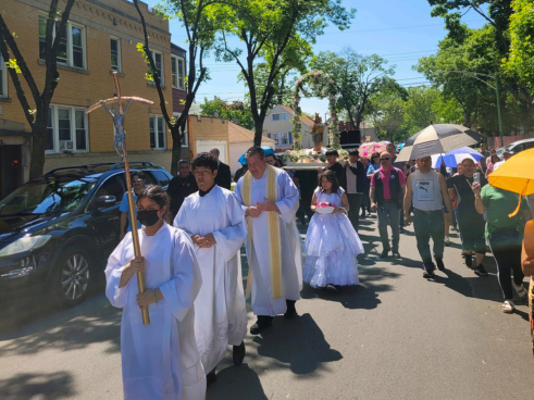 Fr. Rich Alejuanas (third from left) leads the procession in Chicago