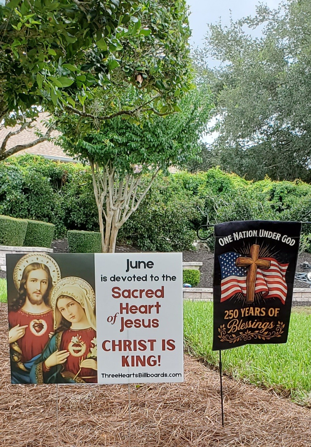 Florida: A lawn sign for June’s dedication as the month of the Sacred Heart of Christ, as well as one for America’s 250th birthday 