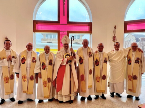 The Very Reverend Joseph A. Espaillat (center) is joined by Fr. Ryan Muldoon, Archdiocese of New York, a Don Bosco Prep alumnus (Class of 2009) and members of the Ramsey community.