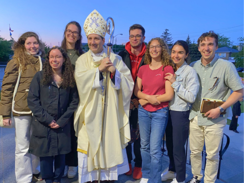 Archbishop Leo with young people after the Mass