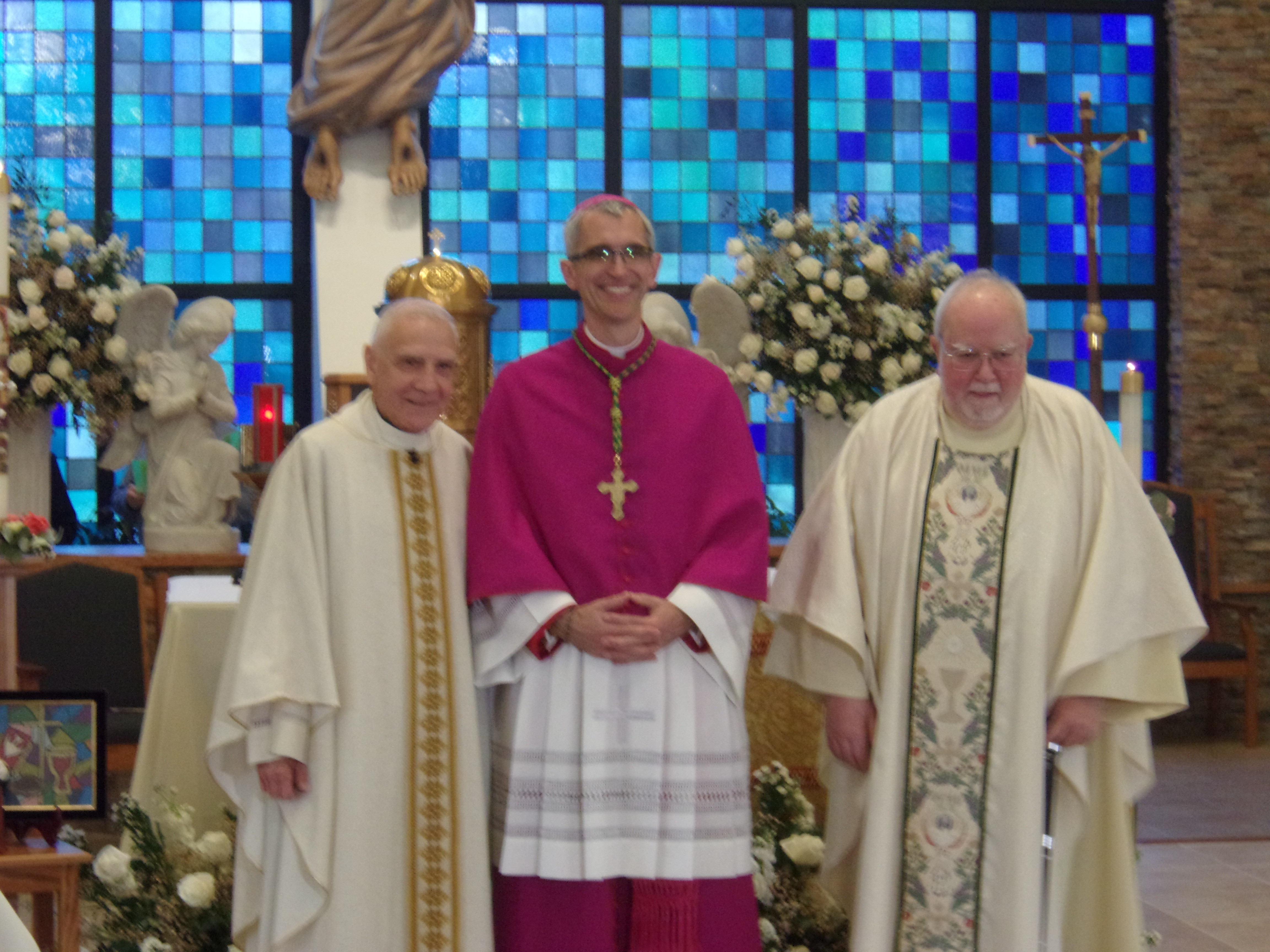 Fr. Pat, Bishop Cooke, and Fr. Bill after the Mass for Fr. Pat and Fr. Bill’s 50th anniversary of priestly ordination