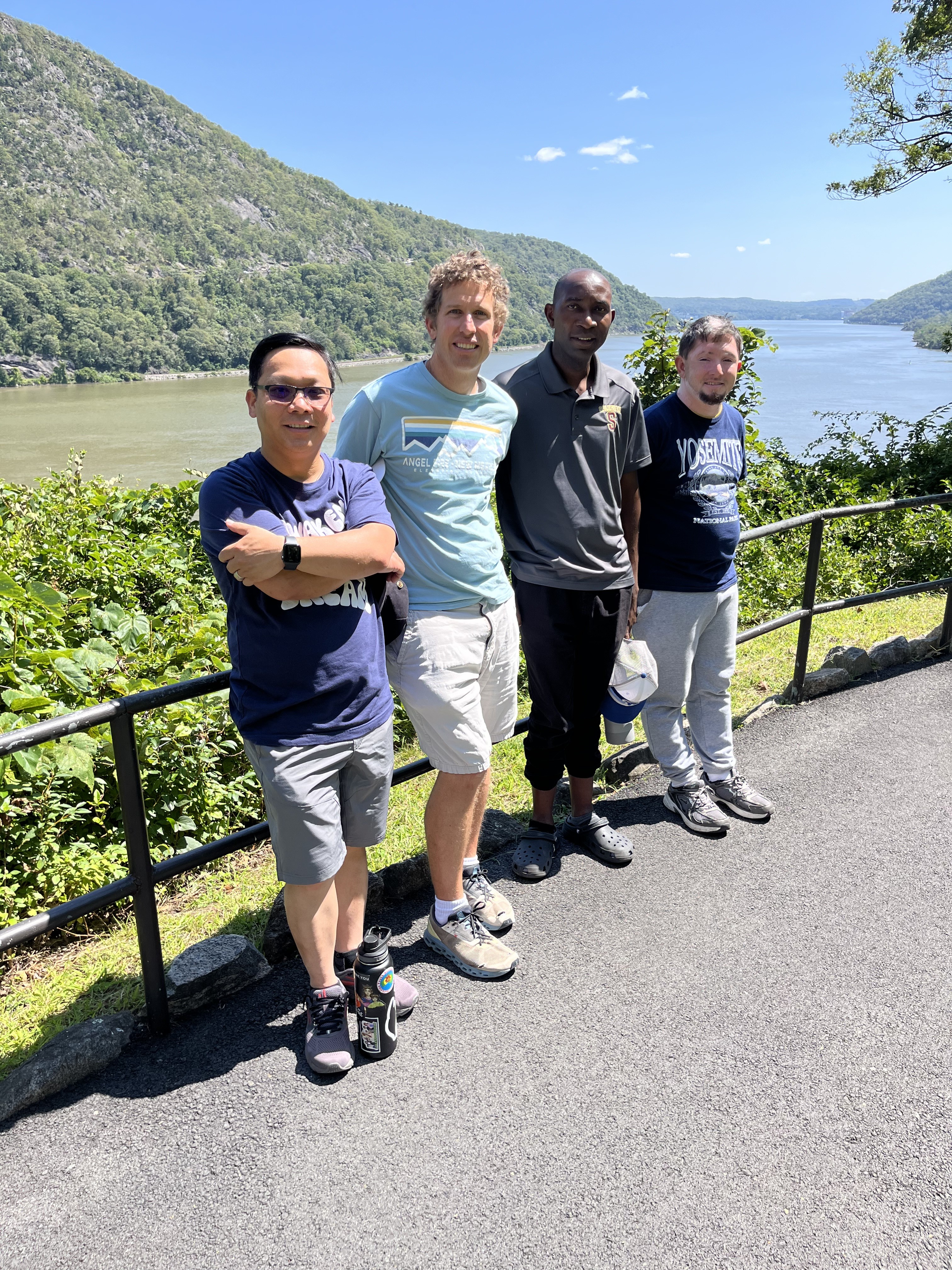 Brs. Mintu, John, Pascal, and Candicate JJ pose by the Bear Mountain Bridge