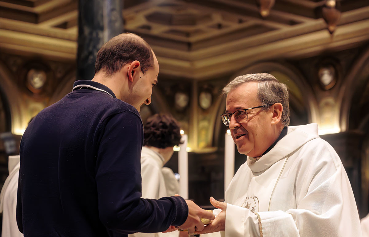 Rector Major Fr. Fabio Attard, SDB, greets a young man