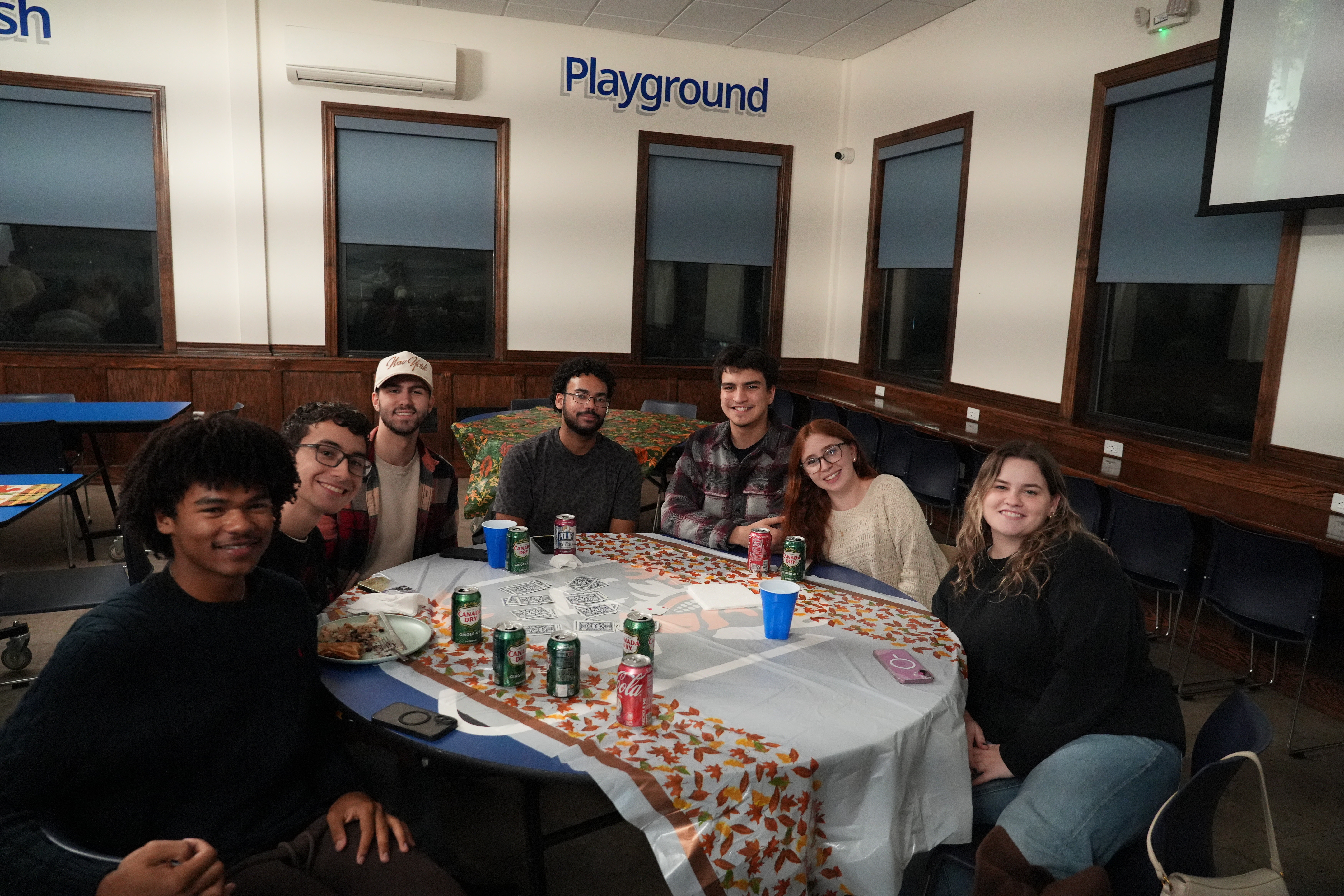 Friends from New York take a break from their card game.