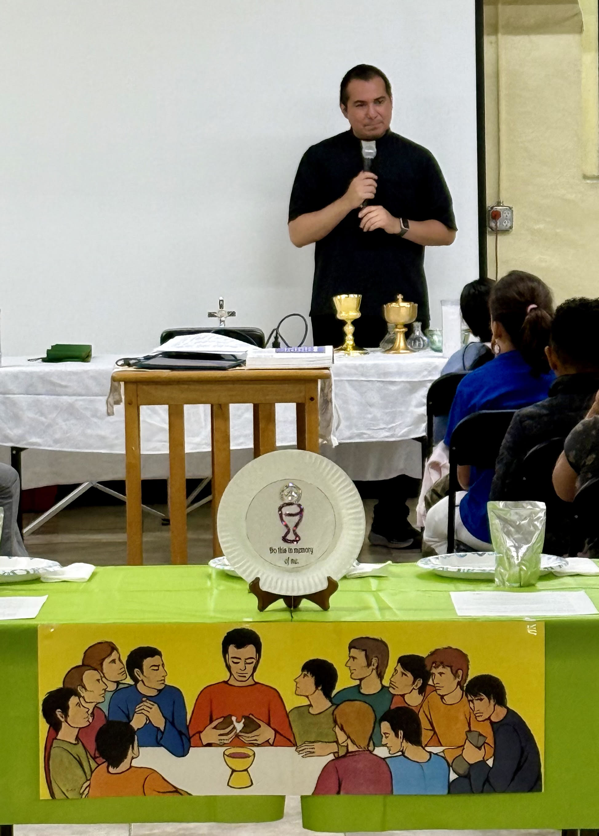 Fr. Eddie explains the sacred vessels during one of the two Eucharist retreats.