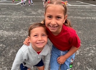 New Rochelle: Two campers enjoy fun and recreation.