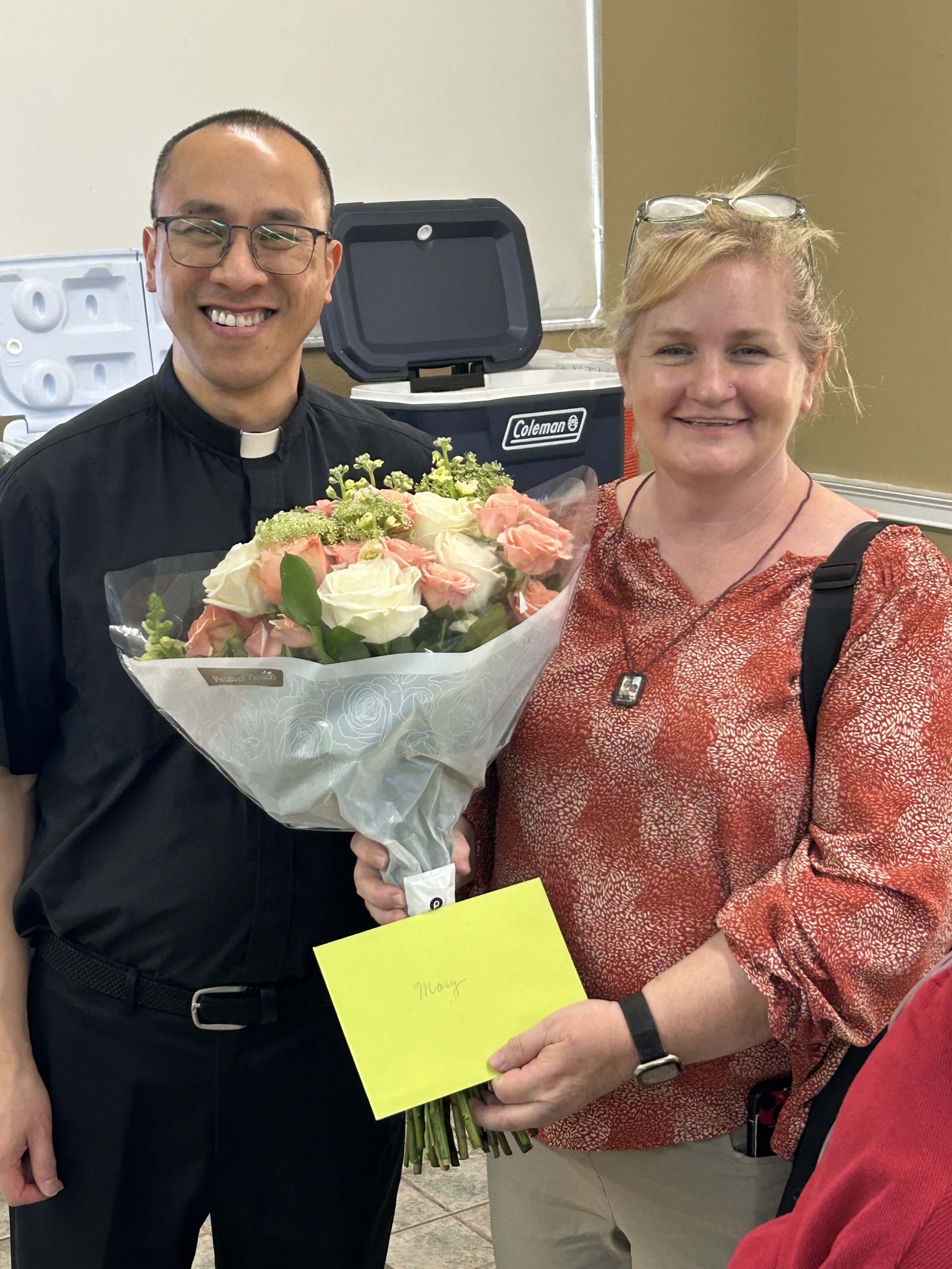 Provincial Fr. Dominic Tran, SDB, and Mary Help Tampa employee Mary Sverko