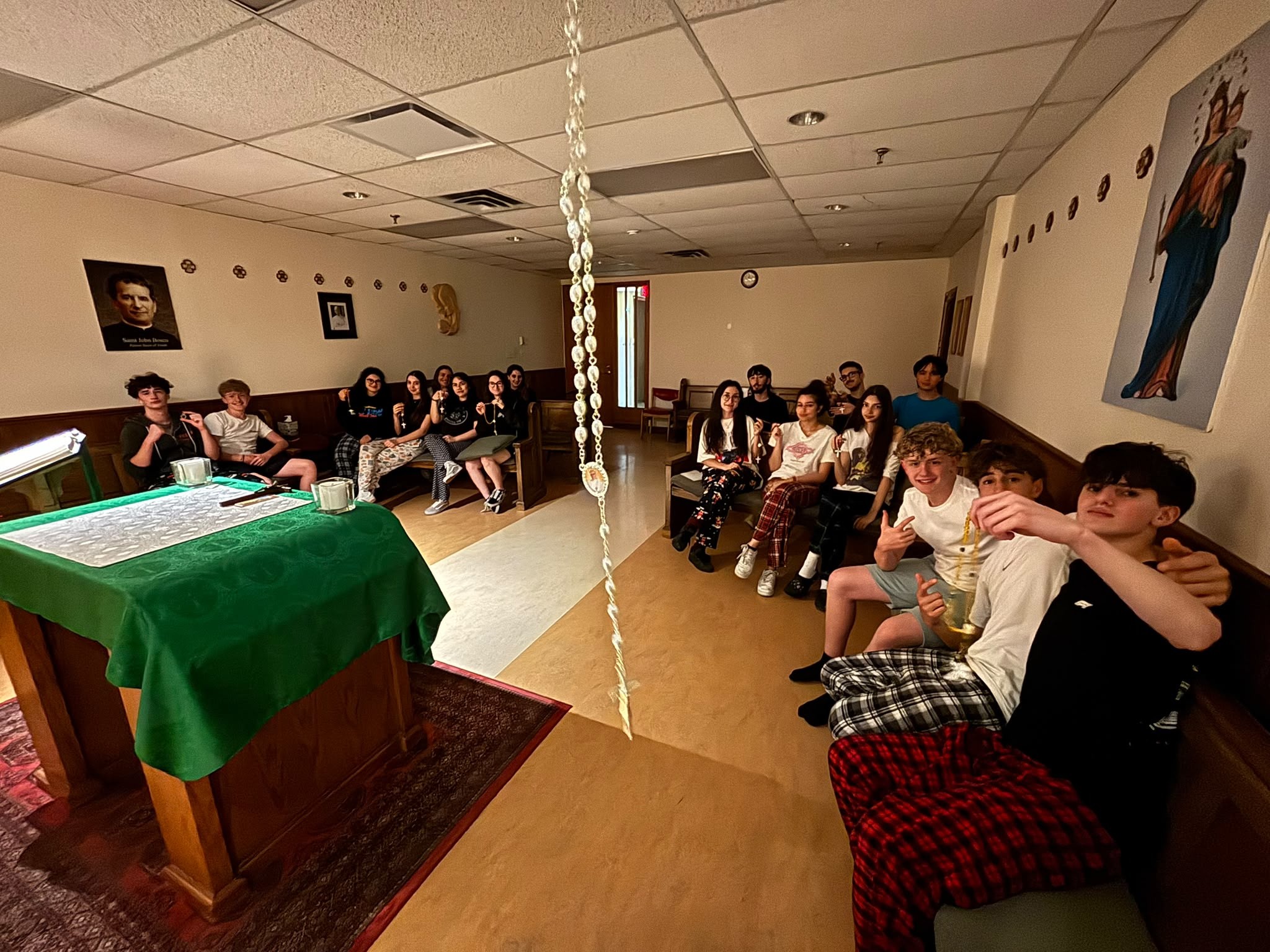 Montreal: Valdocco Retreat attendees pose with their rosaries in the chapel.