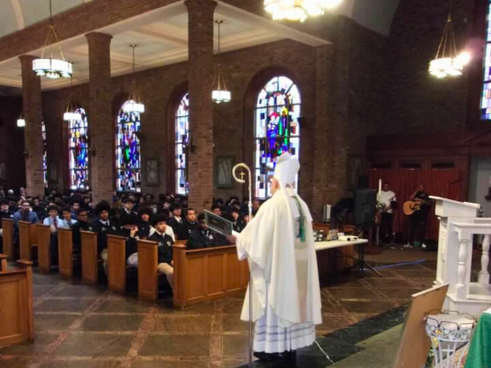 New Rochelle: Bishop Joseph A. Espaillat addresses Salesian High and New Rochelle community  in attendance at Holy Name of Jesus Church on the feast of St. John Bosco.