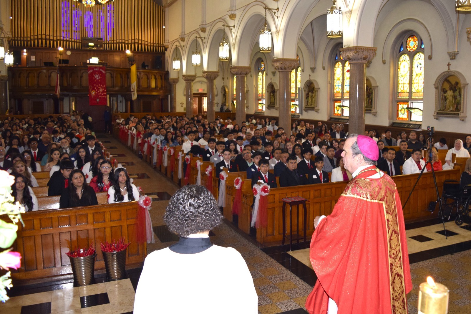 Port Chester: Most Reverend Bishop Manuel Cruz, DD, addresses the confirmation youths and their sponsors and families.