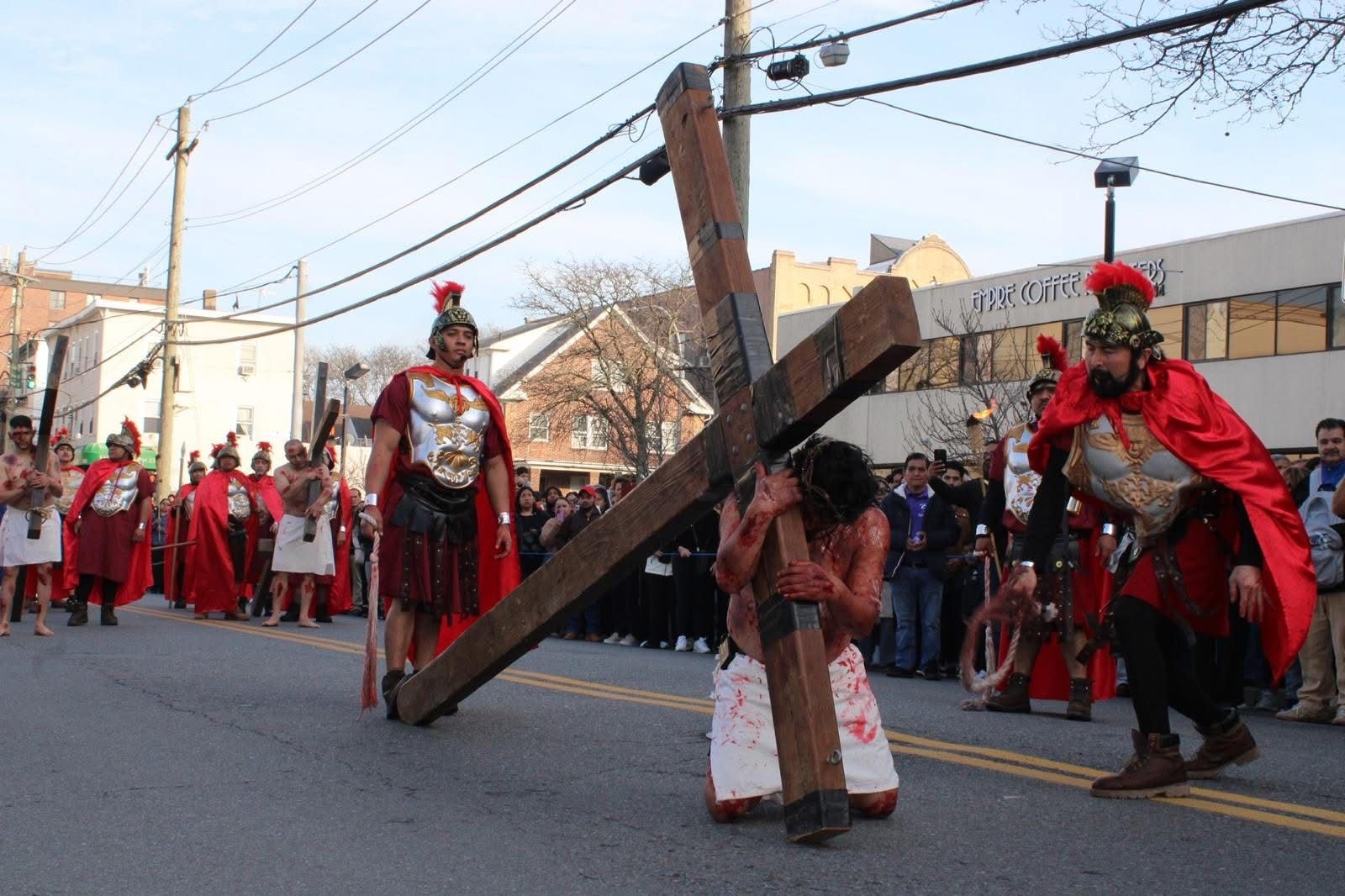 A powerful scene from the Good Friday procession, where Jesus falls as he carries the cross (one of three times).
