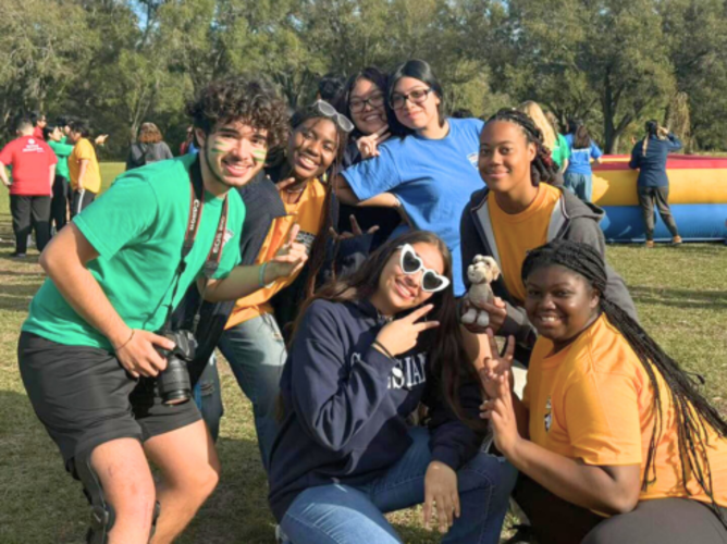 Young people pose with Grigo during the Don Bosco Festival.