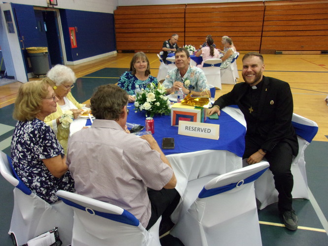 Dcn. Tom and Family Photo by Fr. Mike