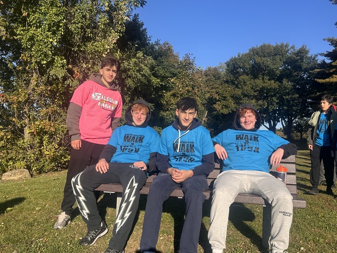 New Rochelle: Salesian High School students take a short break to pose for a photo in Five Islands Park.