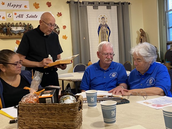 Salesian Cooperator Pilar Goizueta, Fr. Tom Ruekert, and Jim and Paula Dolan