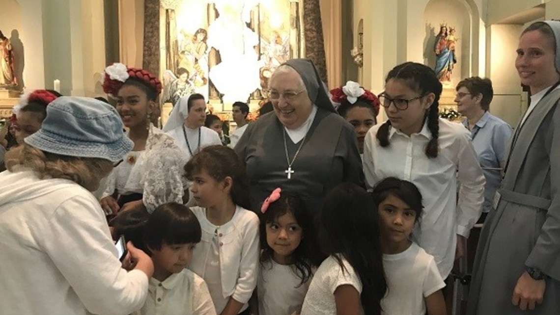 Mother Yvonne with kids