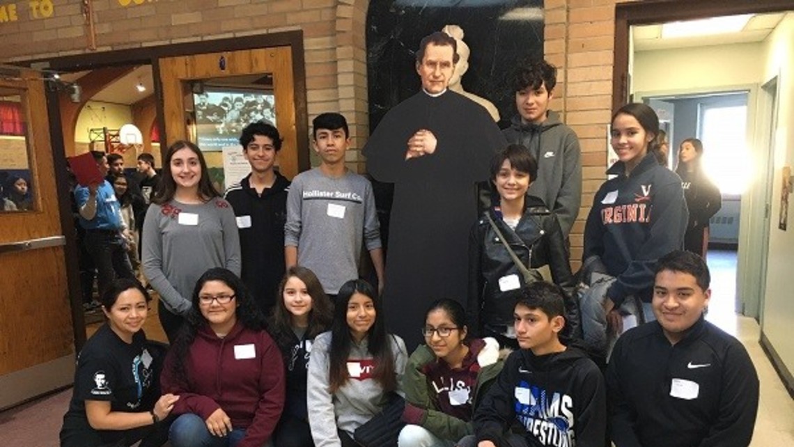 Group leader Elizabeth Sigua and her group of young people with Don Bosco