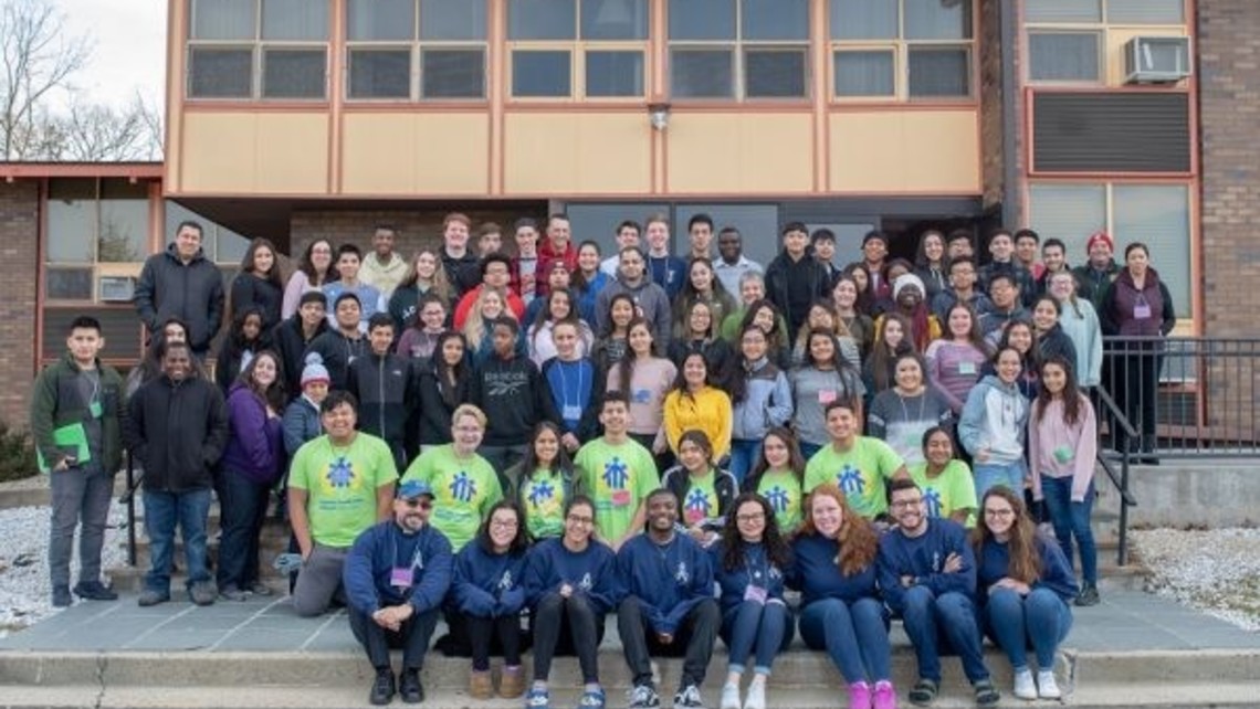 Participants gather outside the Don Bosco Retreat Center 