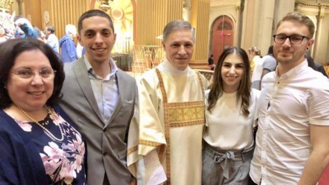Cathy, son Vincenzo, Deacon Nick, daughter Nadia, and her boyfriend Karl