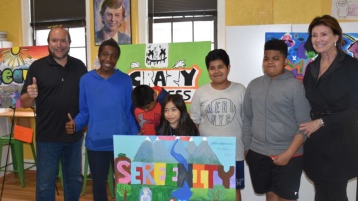 Daniel DeNapoli and Ann Heekin with some participants of The Mural Painting program.