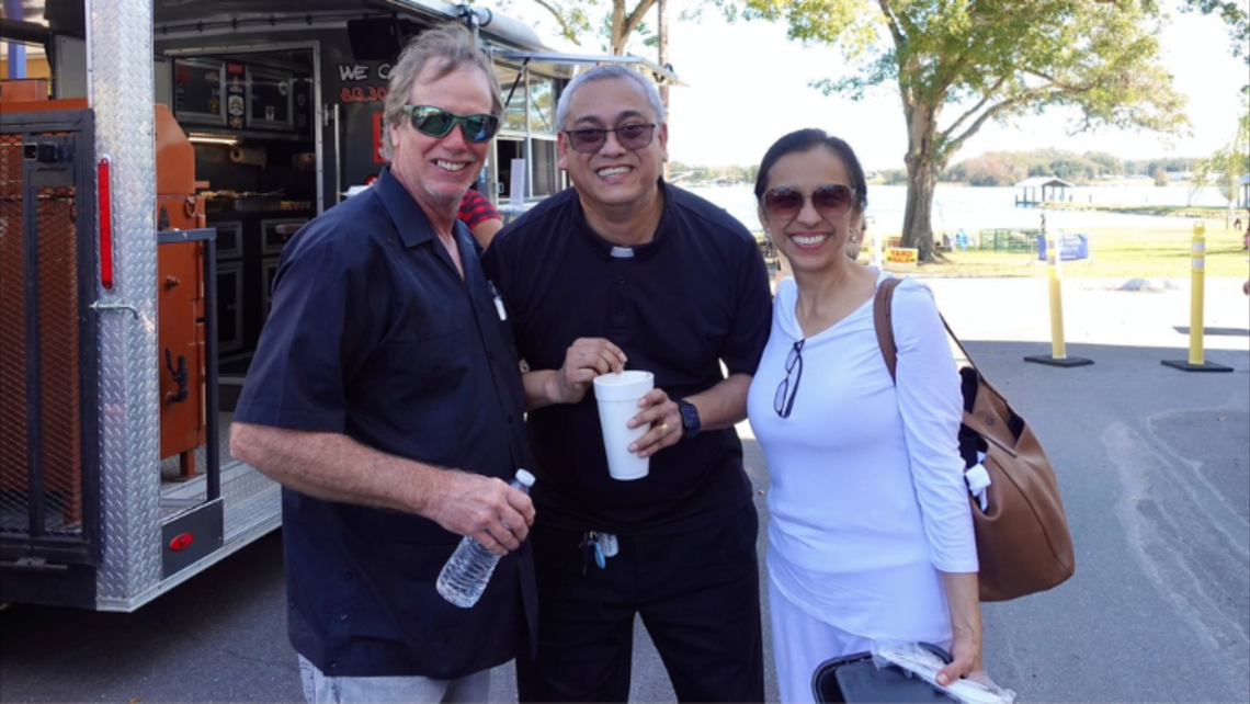 Tampa Director Fr. Franco Pinto, SDB (center), with Salesian Family members | Photo by Chioma Okoye Don Bosco Festival and Gala in Tampa
