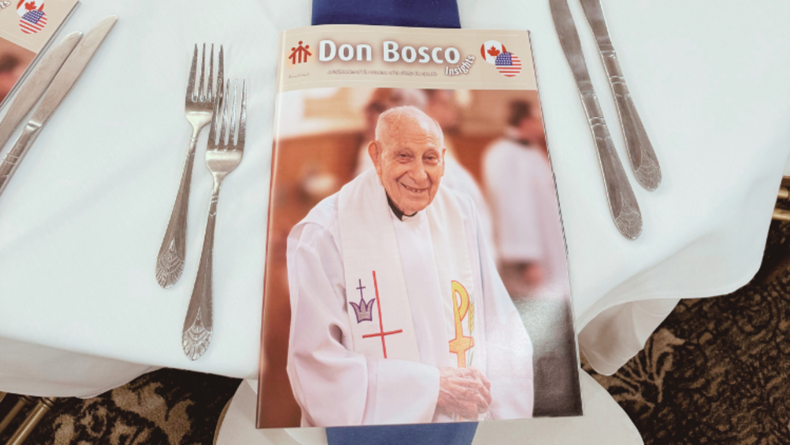 Issues of Don Bosco Insights placed on each place seating at the reception for the 2025 Jubilees | Credit: Julia St. Clair Don Bosco Insights Vol. 2 Web