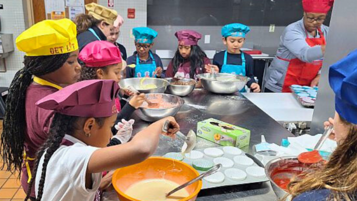 Club staff and members bake cupcakes together. | Photo by Bro. Bob Metell, SDB East Boston's New Baking Program