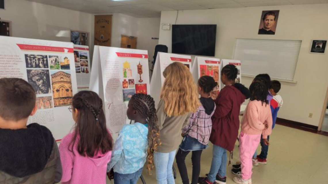 Schoolchildren gaze at the Eucharistic Miracles Exhibition | Photo by Rev. Dr. Adaikala Raja John, SDB Edmonton Eucharistic Miracles Exhibition