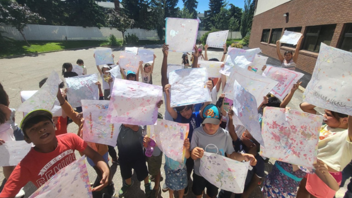 Campers happily display their paintings | Photo by Joyce Labelle Edmonton Summer Camp