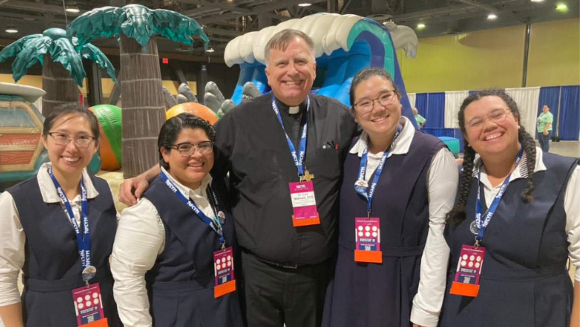Fr. Lou Molinelli, SDB, (second from left) and FMA postulants | Photo by Fr. Lou Molinelli, SDB Fr. Lou at NCYC 2022