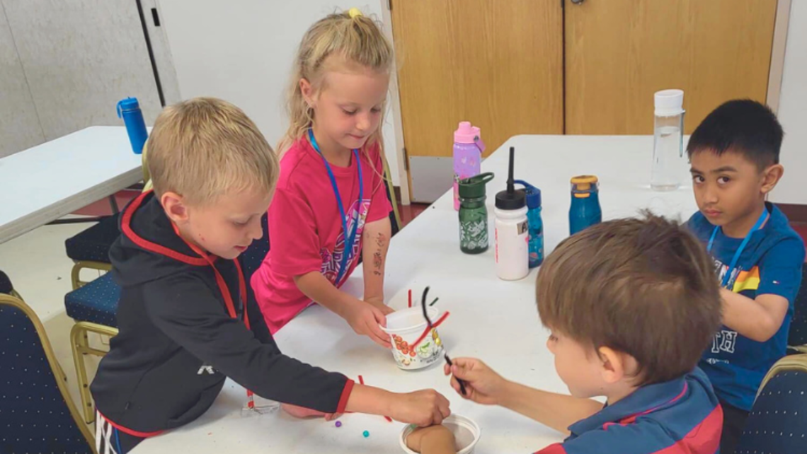 Children make crafts during a day at St. John Bosco Parish's summer camp in Edmonton, AB | Photo courtesy of St. John Bosco Parish's Facebook Fr. Tim Zaks Letter 07.13.23