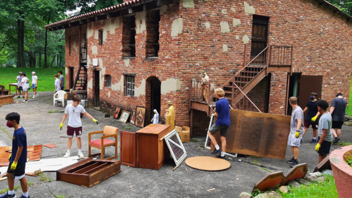 Don Bosco Prep students clean up the Becchi House | Photo by Fr. Dennis Donovan, SDB Marian Shrine Cleanup Day
