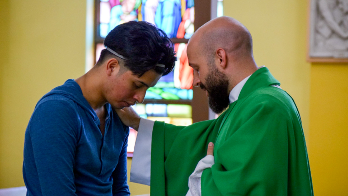 Fr. Steve DeMaio, SDB, (right) blesses Lucas Gemio during YAR 2022 | Photo by Salesian Youth Ministry Message of the Provincial 01.12.23