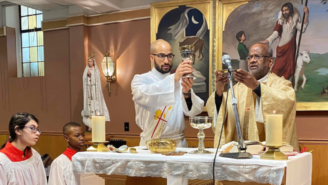 (from left to right) Dcn. Branden Gordon, SDB, concelebrates Mass with Fr. John Louis Mariapragasam, SDB, at St. Benedict Parish earlier this month | Photo courtesy of St. Benedict Parish's Facebook Message of the Provincial 01.26.23