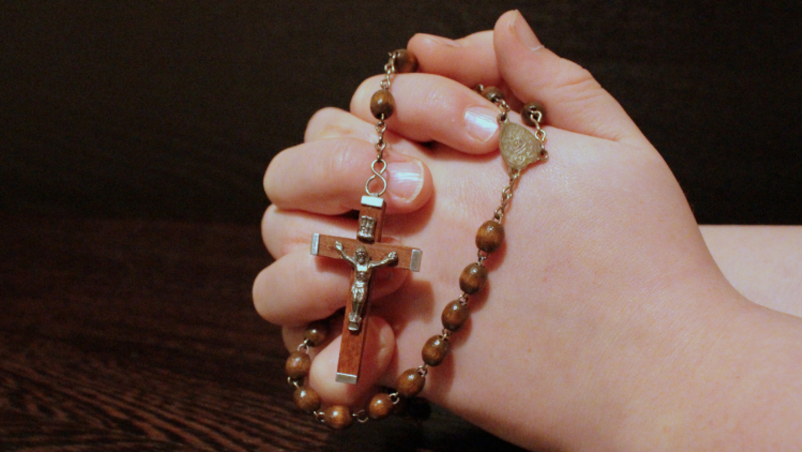 Young person holding the Rosary | Photo courtesy of Canva Pro Message of the Provincial 03.24.22