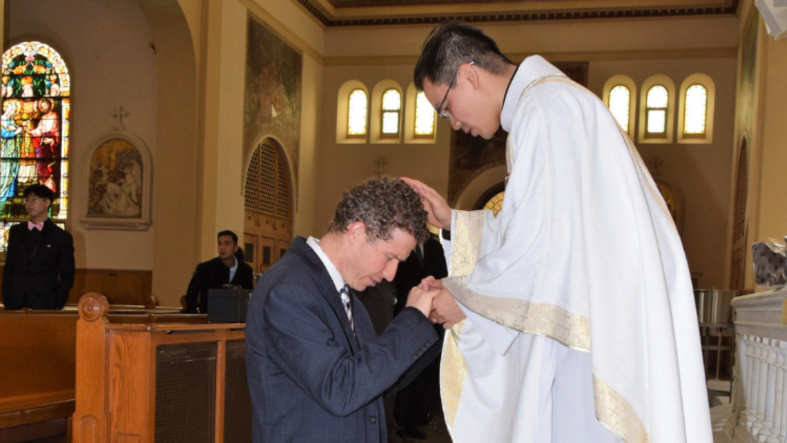 (from left to right) John Taylor receives a blessings from Fr. Ky Nguyen | Photo by Salesian Youth Ministry Message of the Provincial 09.08.22