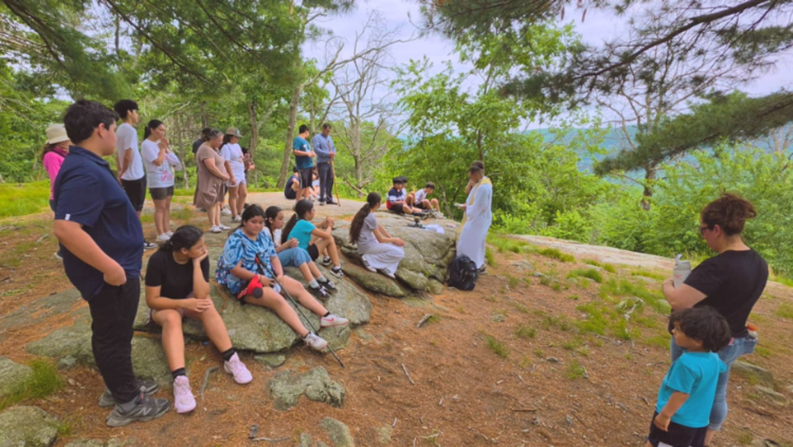 St. John Bosco Parish altar servers celebrate Mass on Bear Mountain. | Credit: Fr. Eddie Chincha, SDB Port Chester Altar Servers' Outing to Bear Mountain