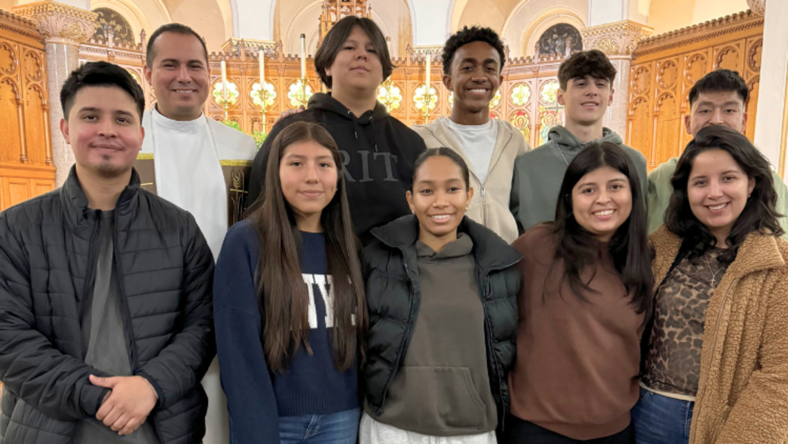 Fr. Eddie Chincha, SDB (top right), and the youth group | Courtesy of Fr. Eddie Chincha, SDB Port Chester: Youth Ministry on Fire to Live the Gospel