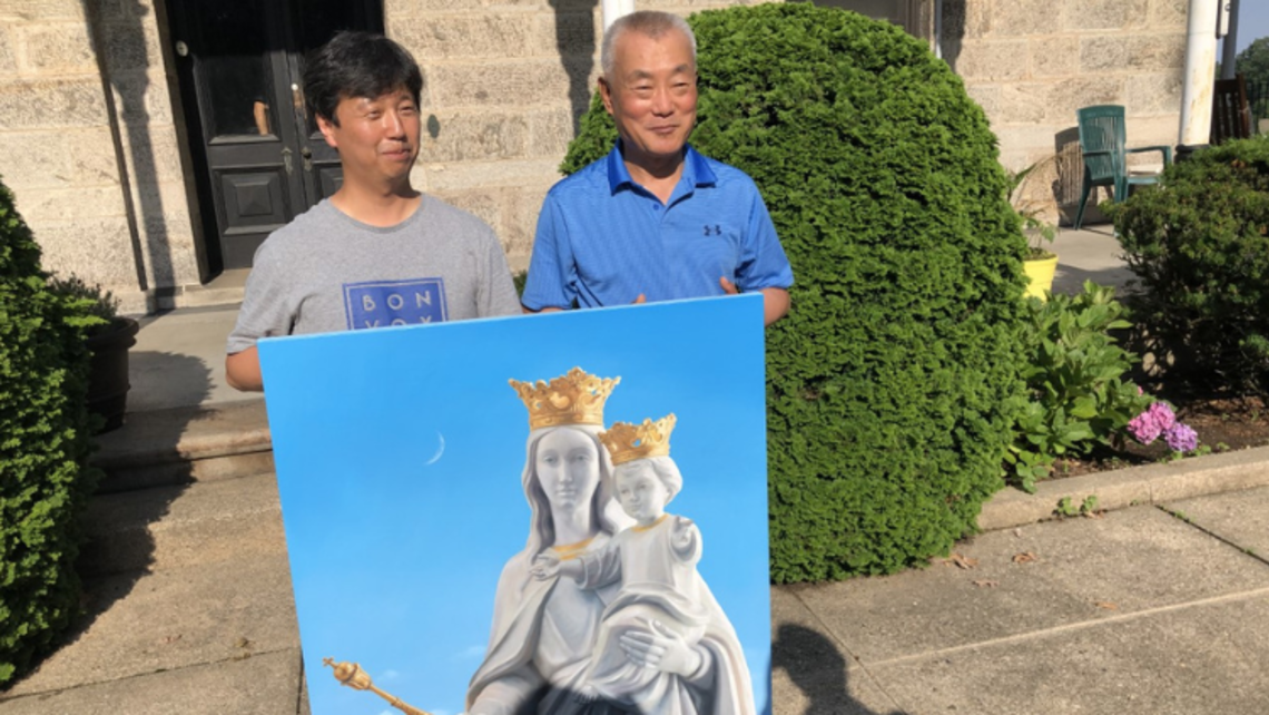 (front left to right) Professor Kim and Fr. Gus Baek, SDB | Photo by Fr. Mike Mendl, SDB Professor Kim and Fr. Gus with painting