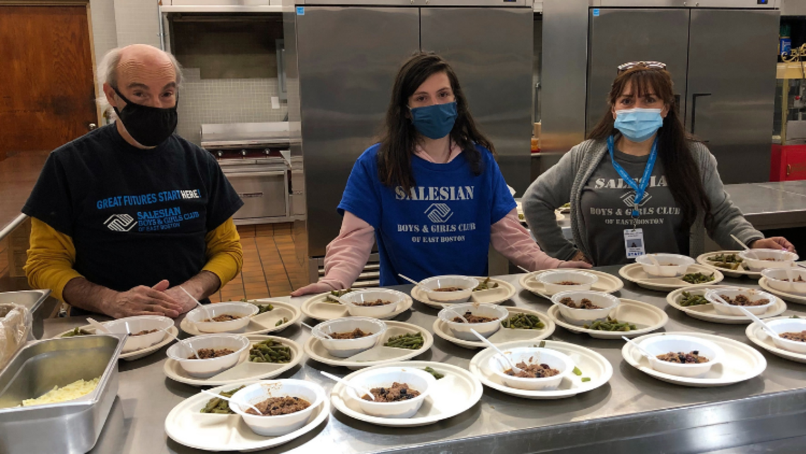 Br. Bob, Damien, and Maria at the serving line | Photo by Jimmy Gerasi, Business Manager Salesian Boys & Girls Club