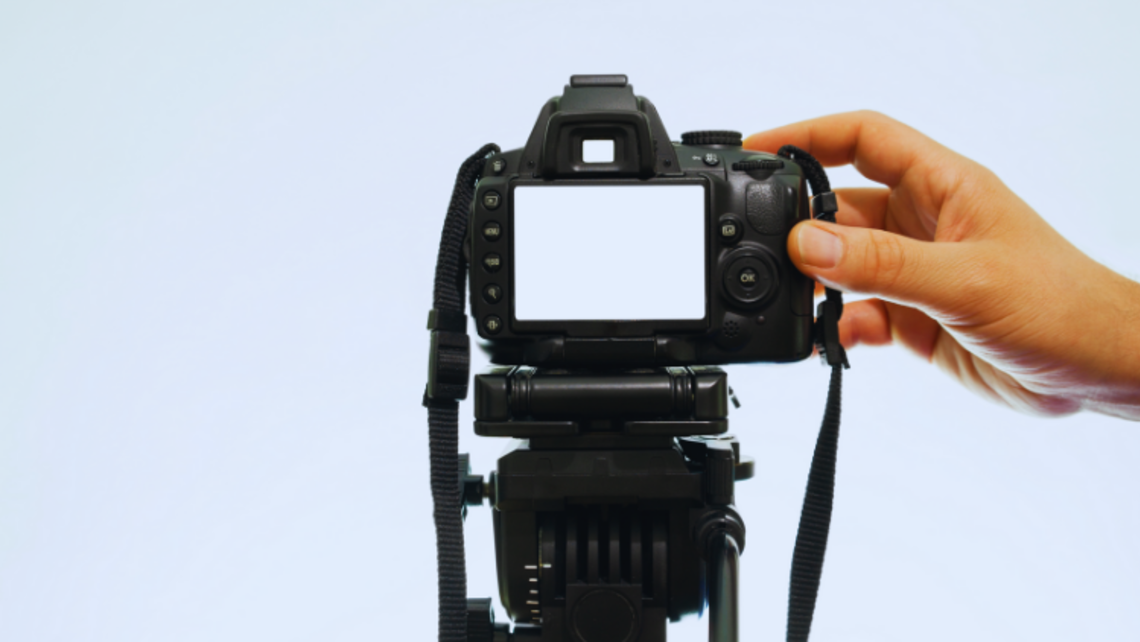Setting up for taking formal photos | Photo by sonmez from Getty Images Send Photos