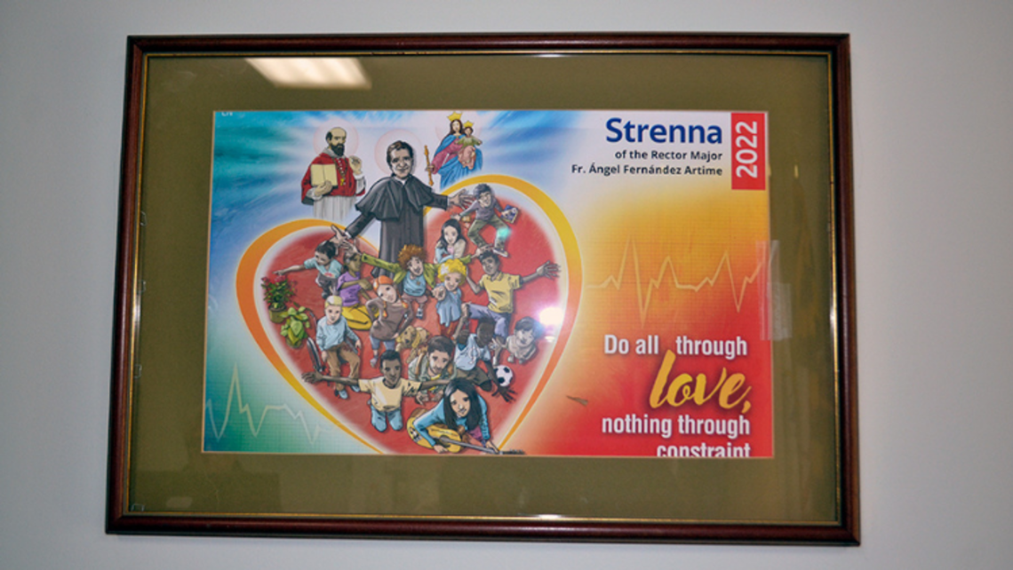 Framed poster of the strenna in the main lobby | Photo by Julia St. Clair Sf Spirituality Days