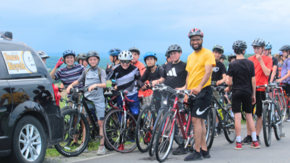 Fr. Branden Gordon, SDB (in yellow shirt) with Bosco Bicycle campers | Photo by Fr. Alain Léonard, SDB Sherbrooke Bosco Bicycle