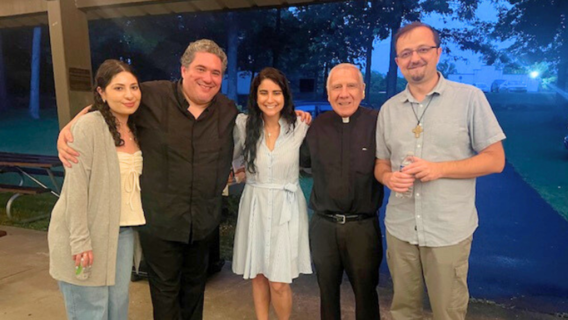 Frs. Manny Gallo (second from left), Pat Angelucci (second from right), and Yuriy Smakous (right), SDBs, with members of the Shrine’s young adult community | Credit: Mrs. Jennifer Passerino Stony Point: Young Adult Night