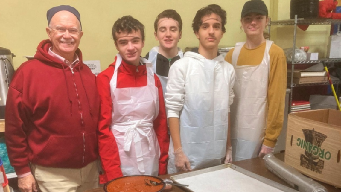 Br. Bernie Dubé takes Salesian High students to volunteer at the Don Bosco Community Center's soup kitchen | Photo courtesy of Salesian High School's Facebook SYM Corner 05.10.23