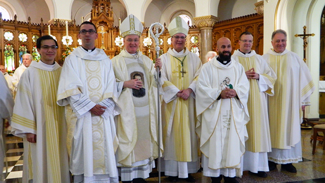 Bishops with the ordinati (newly ordained), Dcn. Craig, and Fr. Tim Zak, Provincial | Photo by Fr. Mike Mendl, SDB Three Salesians Ordanied