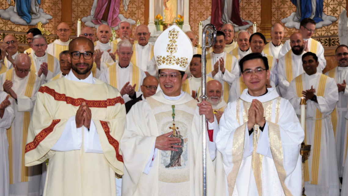 (front of photo, from left to right) Dcn. Branden Gordon, SDB; the Most Rev. Vincent Nguyen, Auxiliary Bishop of Toronto; and Fr. Ky Nguyen, SDB | Photo by Gloria Wang Two Salesians Ordained in Orange, NJ