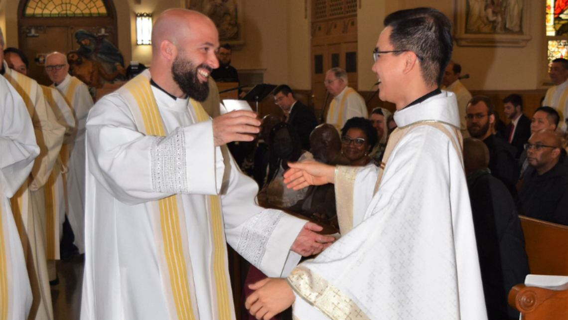 Fr. Steve DeMaio, SDB, embraces newly ordained Fr. Ky Nguyen, SDB, May 2022 | Photo by Salesian Youth Ministry World Day for Consecrated Life 2023