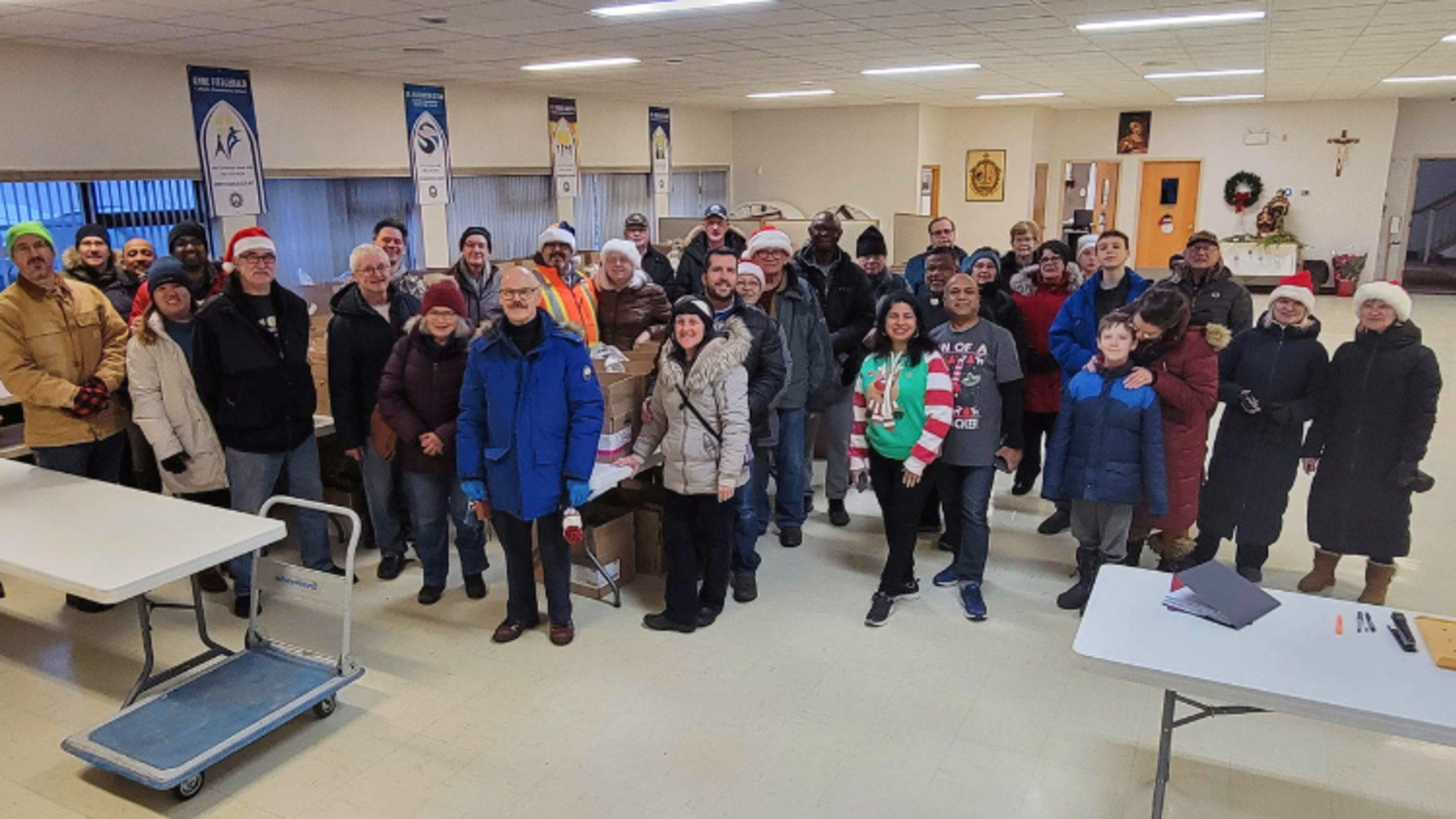 St. John Bosco parishioners and the KC | Photo by Fr. Adaikala Raja John, SDB Christmas Food Hampers in Edmonton