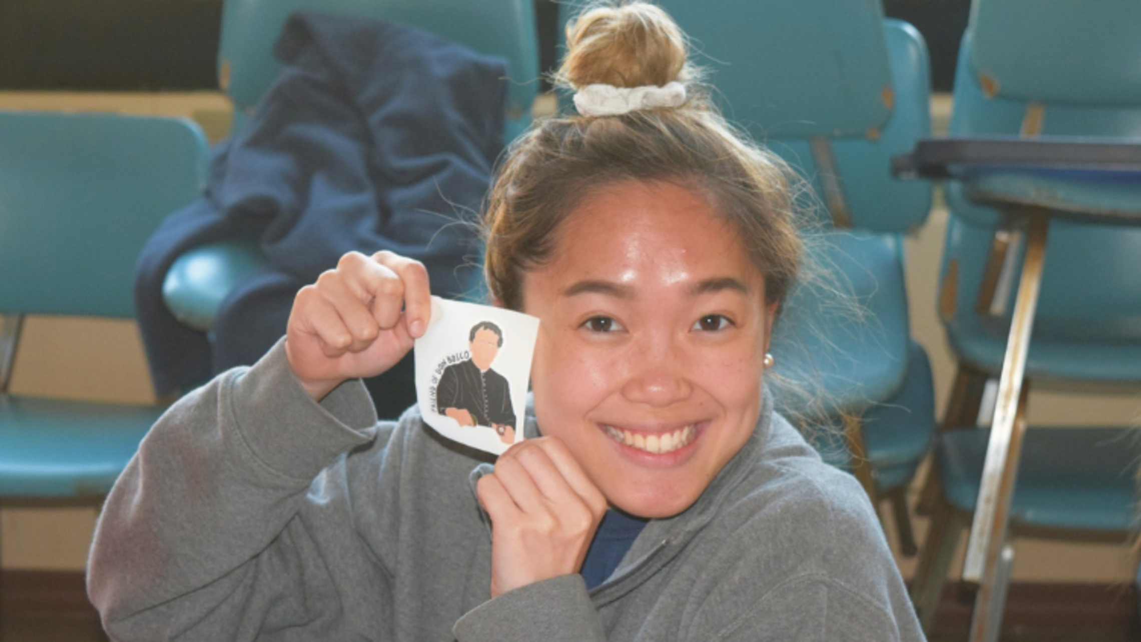 A YAR attendee models one of the new stickers from the province office of youth ministry | Photo by Salesian Youth Ministry June Retreats at the Marian Shrine